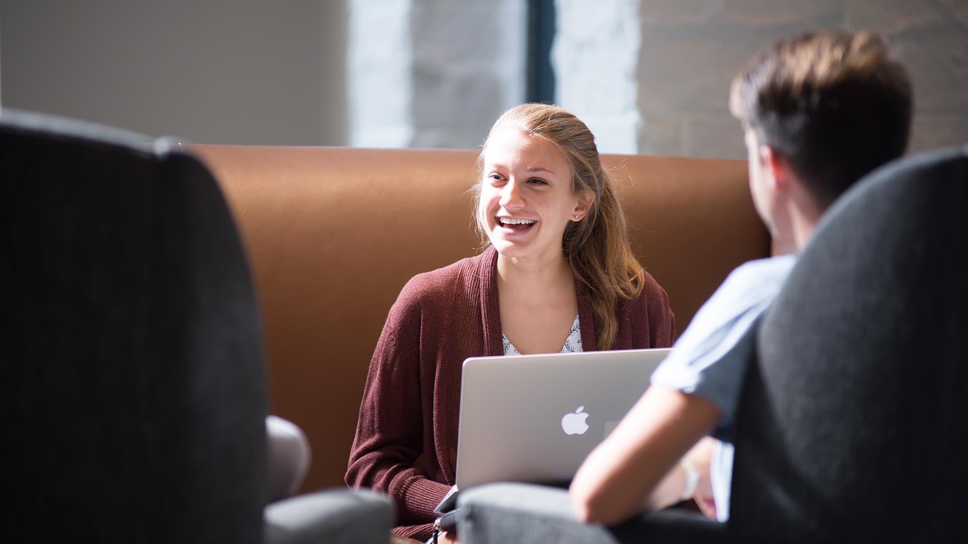 Students relaxing and studying in the Ferguson Center Great Room.