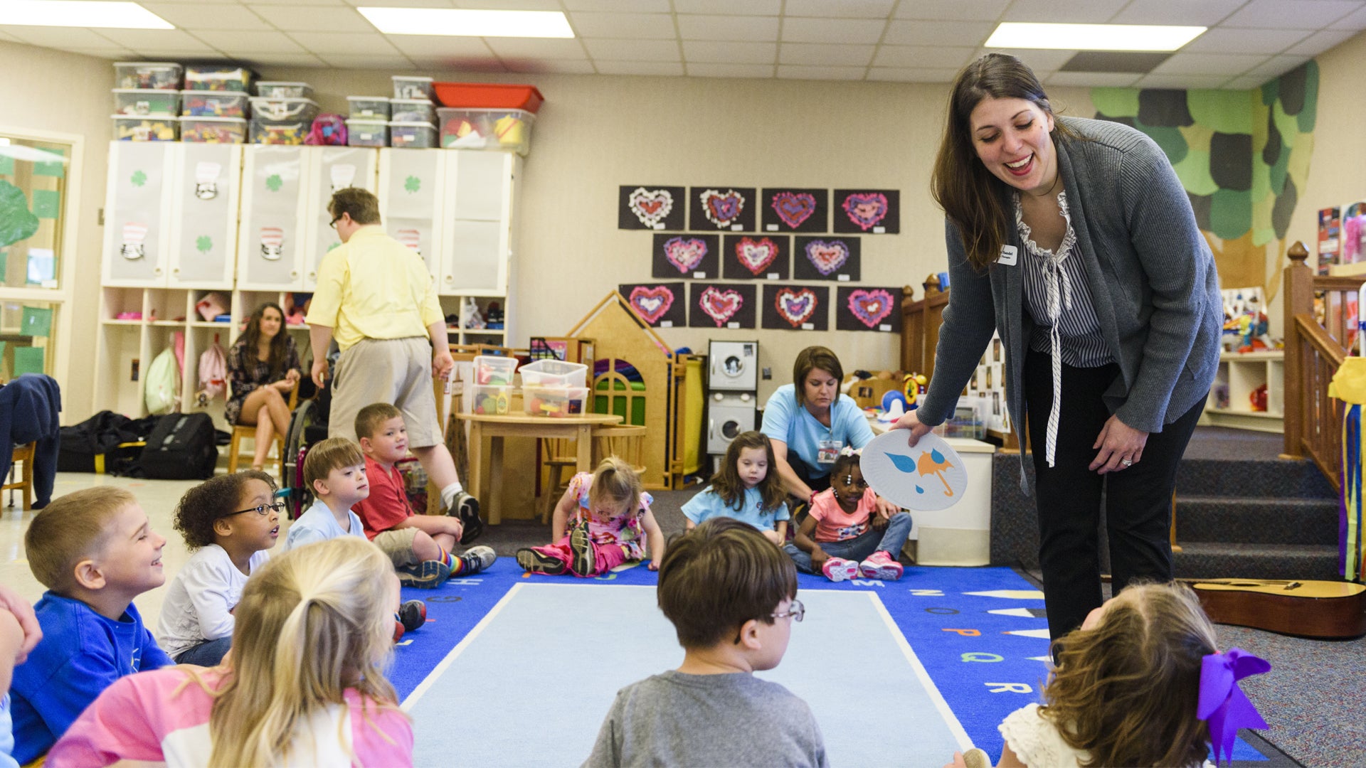 A RISE teacher leading her students in an activity
