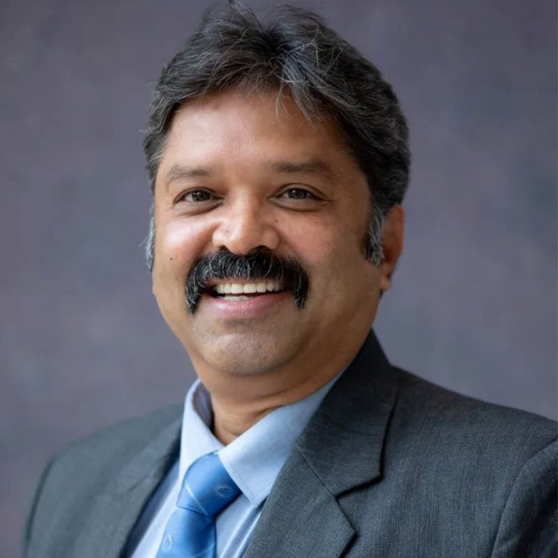 A headshot of Ravi Kumar
