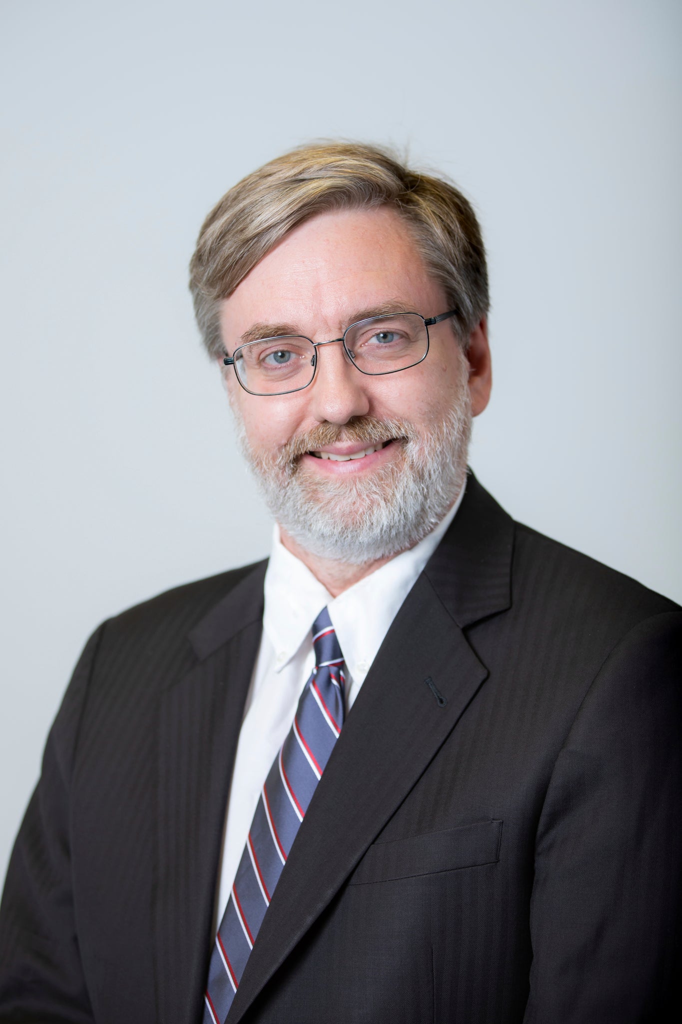 A headshot of Brian Butler